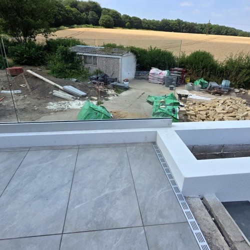 Frameless Glass Balustrade to a Raised Patio — Wombwell, Barnsley Frameless Glass Balustrade to a Raised Patio — Wombwell, Barnsley